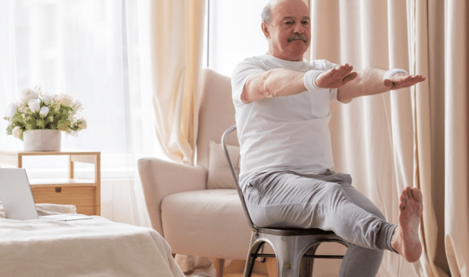 Man exercising in his room